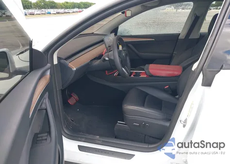 2025 Tesla Model Y Long Range Dual Motor All-Wheel Drive z USA, uszkodzony, nr VIN 7SAYGAEE4SF283972